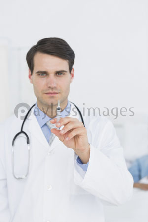 A handsome man's doctor holds pouring.