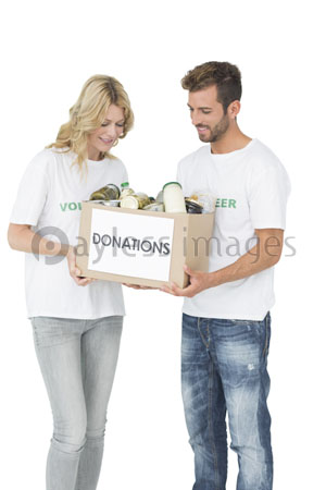 It,smiles,and,expresses,the,young,couple,who,carries,a,donation,box.