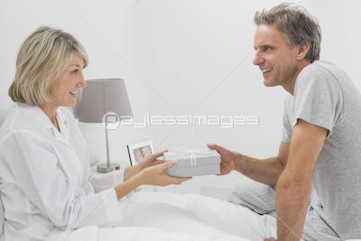 Man giving present to his partner