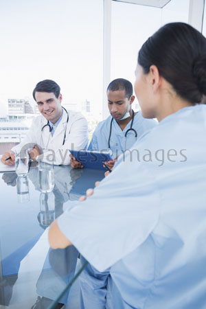 The doctor in the meeting in a hospital