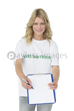 The portrait of holding clipboard of smiling young female volunteer