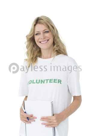 The portrait of smiling young female volunteer