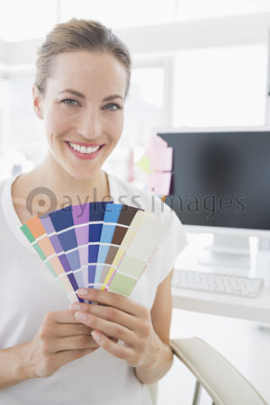 The portrait of the photo editor holding a color