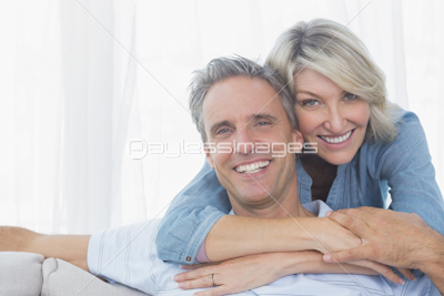 Worried couple going over their debt