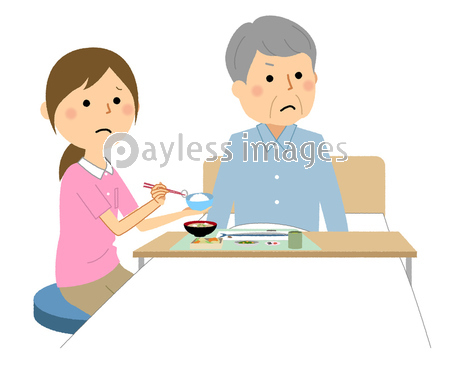 食事を嫌がる高齢者 介護スタッフ 食事介助 ストックフォトの定額制ペイレスイメージズ