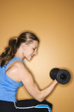 Woman+lifting+weights.