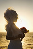 Bride+at+sunset+on+beach.