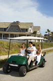 Family+riding+in+golf+cart.