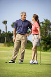 Couple+talking+on+golf+course
