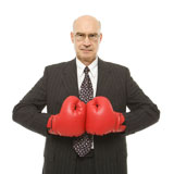 Businessman+boxing+gloves.