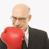 Businessman+boxing+glove.