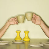 Hands+toasting+cups.