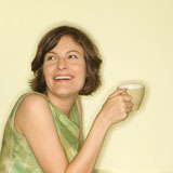 Woman+smiling+with+cup.