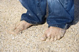 Male+feet+on+beach.