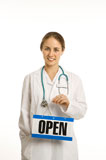 Doctor+holding+open+sign.