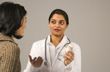 Doctor+explaining+medication.