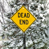 Snowy+road+sign.