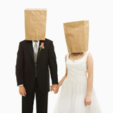 Wedding+couple+with+bags+over+heads.
