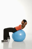 Woman+exercising+with+ball.