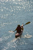 Boy+paddling+kayak.