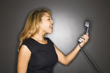 Woman+yelling+into+telephone.