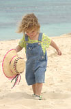Child+walking+on+beach