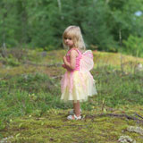 Young+girl+in+a+fairy+costume+standing+in+the+wilderness