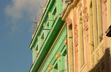 Low+angle+view+of+painted+commercial+buildings%2C+Havana%2C+Cuba