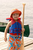 Small+child+holding+an+oar