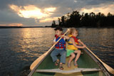 Two+four+year+olds+holding+oars+in+a+boat