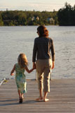 Mother+and+daughter+on+dock+overlooking+lake