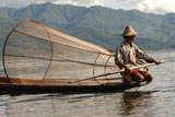 Fisherman+in+row+boat+-+upclose