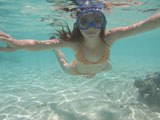 Underwater+view+of+a+young+woman+scuba+diving%2C+Moorea%2C+Tahiti%2C+French+Polynesia%2C+South+Pacific