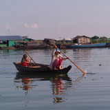 Asian+woman+paddling+a+boat