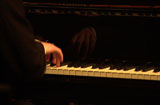 Musician+playing+a+piano