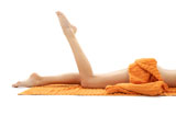 long+legs+of+relaxed+lady+with+orange+towel+%232