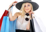 portrait+of+blond+in+hat+with+shopping+bags