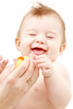 laughing+baby+boy+in+mother+hands+with+rubber+duck