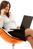 businesswoman+in+chair+with+laptop+and+phone