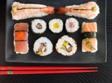 Selection+of+Seafood+And+Vegetable+Sushi+With+Chopsticks+%28Overhead%29