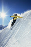 Snowboarder+coming+down+hill