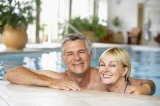 Middle+Aged+Couple+In+Swimming+Pool