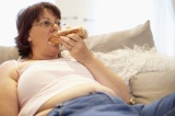 Overweight+Woman+Relaxing+On+Sofa
