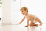 Baby+crawling+indoors+smiling