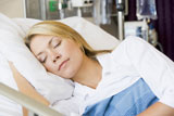 Woman+Asleep+In+Hospital+Bed