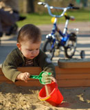 playing+in+sand+pit
