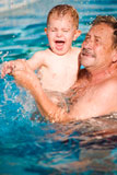 Grandfather+swimming+with+grandson