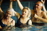 Senior+men+and+two+senior+women+exercising+in+a+swimming+pool