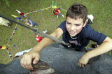 High+angle+view+of+a+boy+rock+climbing