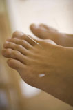 Close-up+of+a+human+foot+receiving+acupuncture+treatment